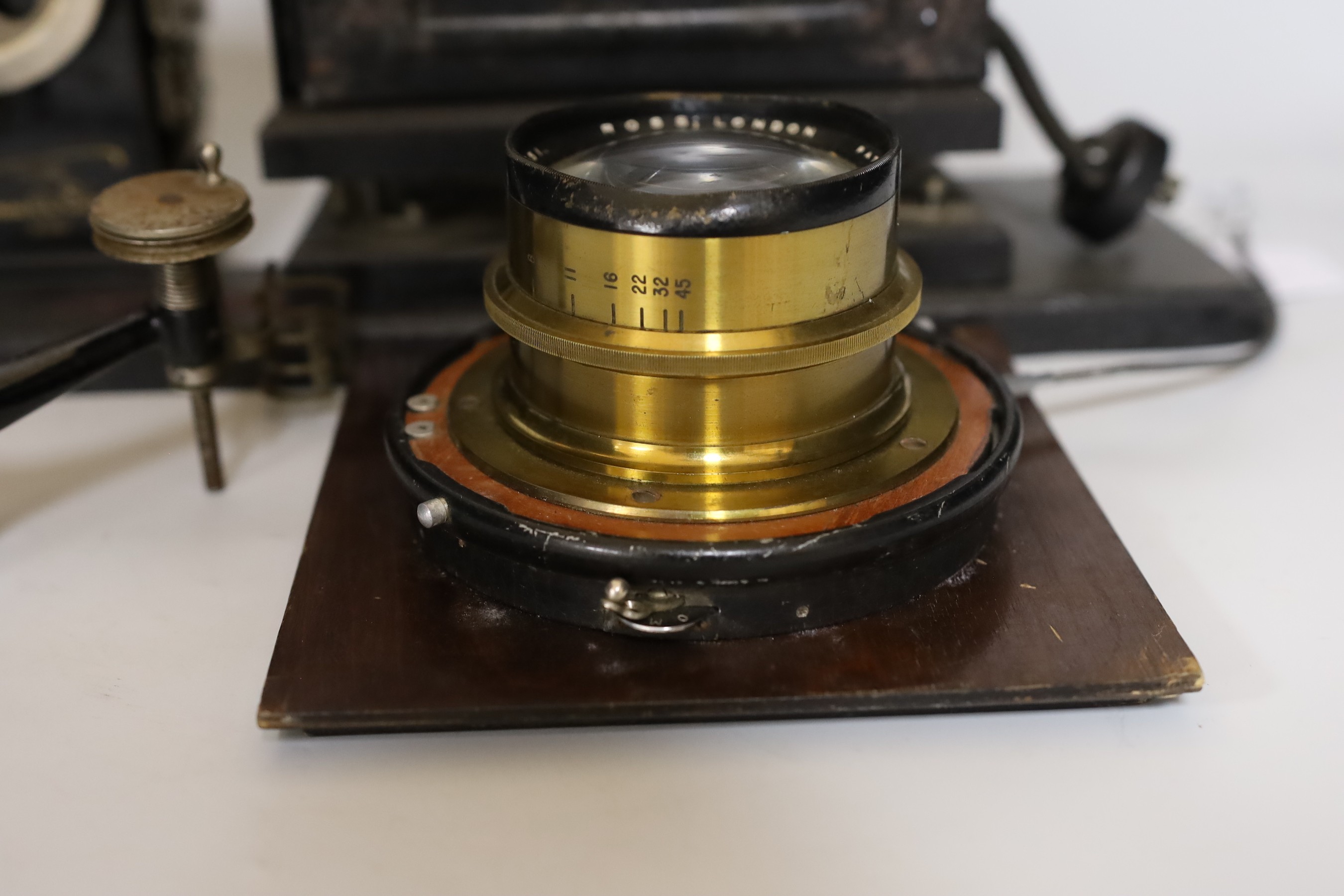 An Edison home kinetoscope, serial number 2364 and a Ross London Patent lens